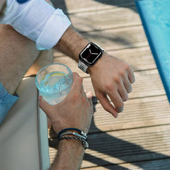 CINTURINO DOOP LINEA INOSSIDABILE APPLE WATCH 6 / 7 / 8 / 9 / 10 / SE / ULTRA 1 / 2 (44 / 45 / 46 / 49 MM) TITANIO/ARANCIONE